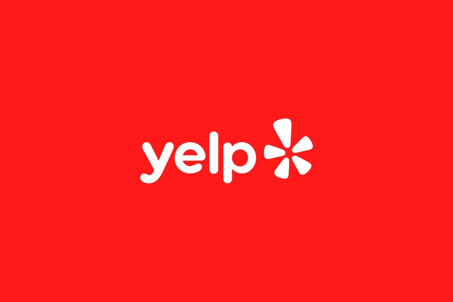 Logo van Yelp op de merkkleur